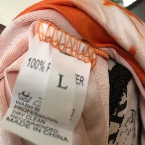 NWOT high/low dress with side pockets. Orange/white flowy 100% polyester - Picture 2 of 5